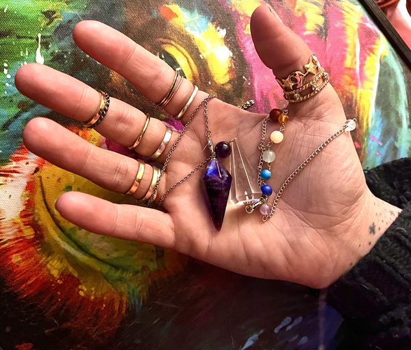 pendulum in ladys hand